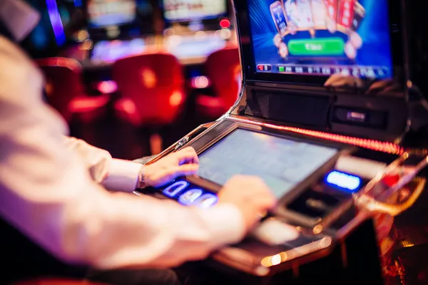 A young woman relaxing with her phone while dynamic casino elements float around her, illustrating the smooth mobile experience offered by the ZS777 app.