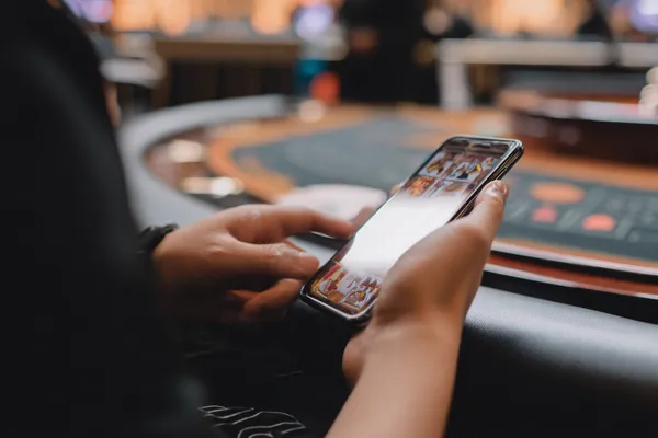 ZS777 Jackpot Slots — Spin for massive rewards A dramatic shot of winning sevens landing on a slot reel surrounded by shining gold coins, symbolizing big wins.